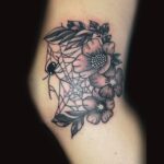 spiderweb flowers tattoo by brynn johnson