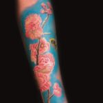 colorful cherry blossoms tattoo by donavan moore