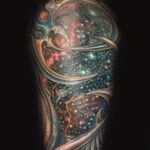 surrealism universe and galaxy tattoo by donavan moore