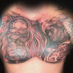 surrealism chest tattoo of a woman bound by ropes and chains by donavan moore