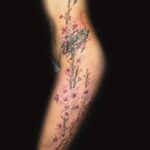 colorful flower tattoo by donavan moore