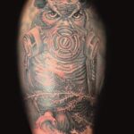 owl wearing gas mask realism tattoo by donavan moore