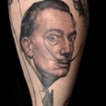 realism portrait tattoo of salvador dali by vaeda russett