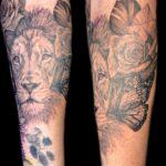 lion and flowers realism tattoo by vaeda russett