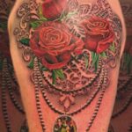 roses and pearls tattoo by donavan moore